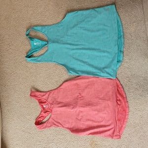 New Born Primitive Tank tops